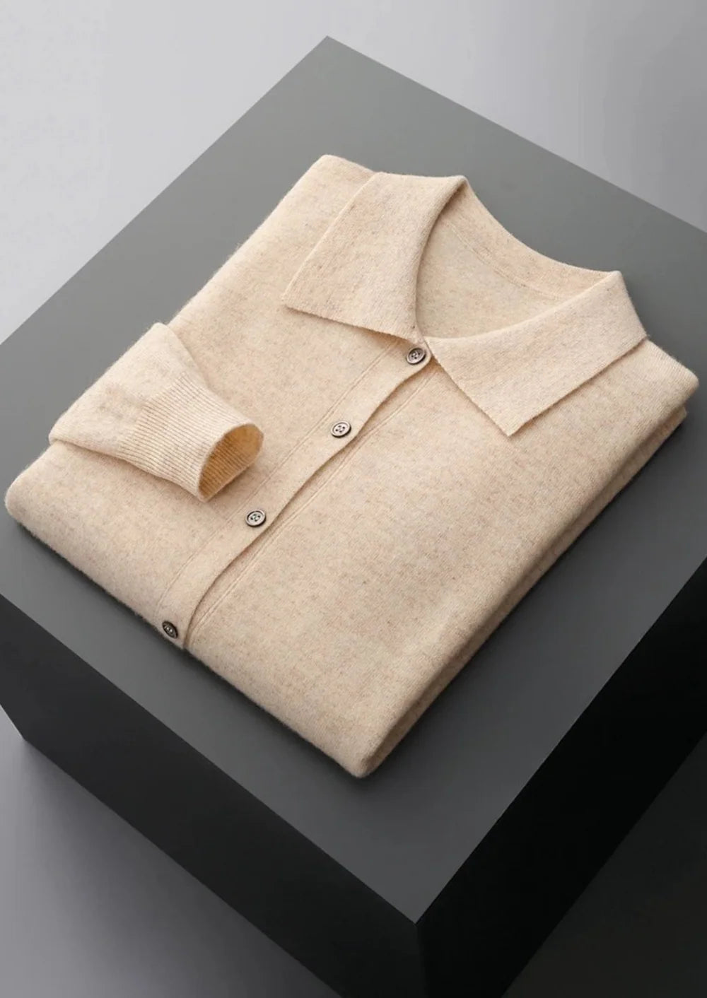 POLO CARDIGAN VAN ZUIVERE EXTRA FIJNE MERINOWOL